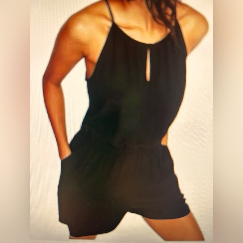 Emma & Michele black short romper. Size L. NWOTGS.